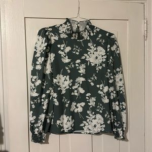 Green floral blouse
